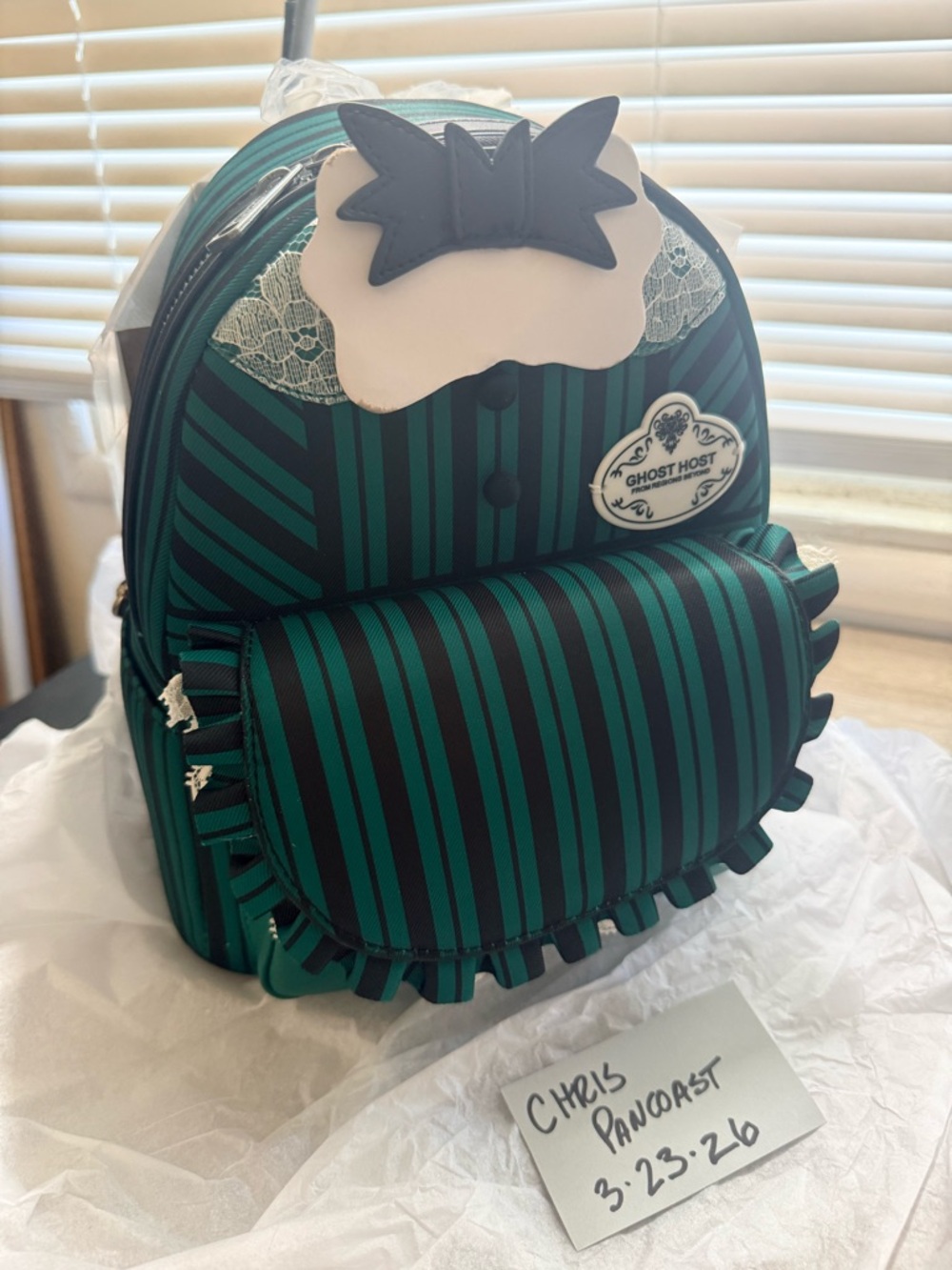 Brand new the Haunted Mansion Ghost Host Loungefly Bag.